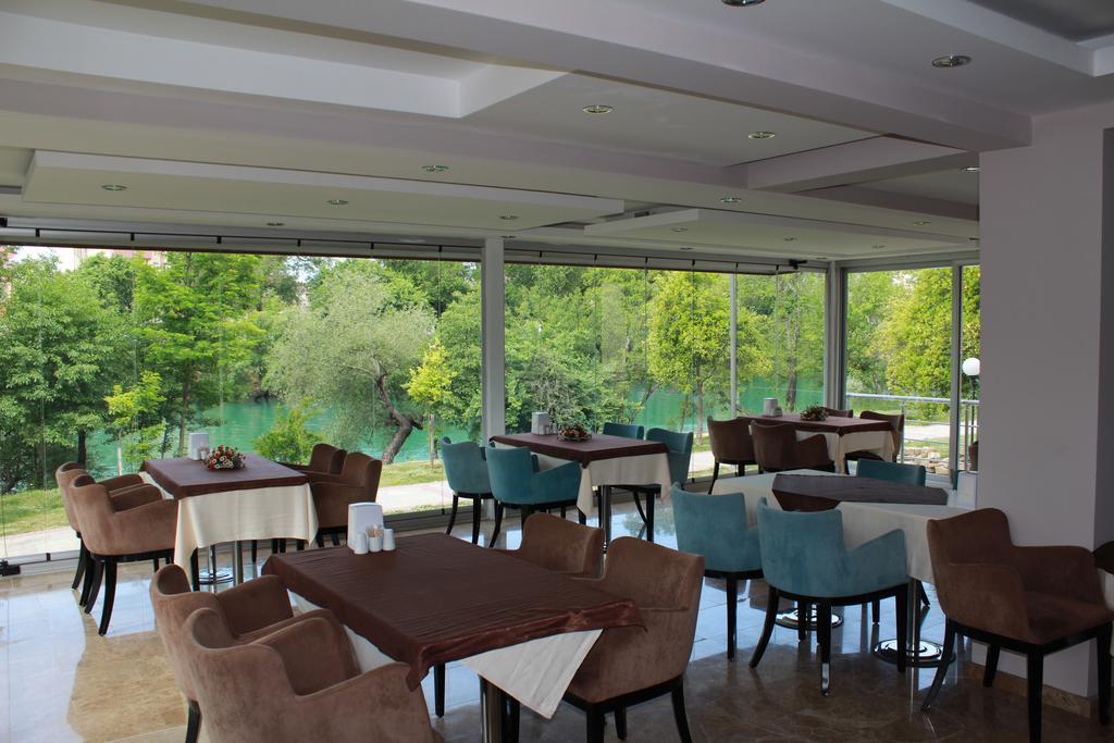 River Hotel มานาฟกัท ภายนอก รูปภาพ